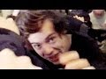 Harry styles reaches for fans camera while being mobbed