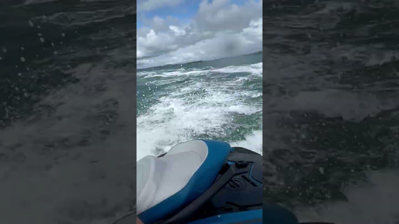 Jet Ski Rider Takes Unexpected Dip in Ocean (Laughing Ensues)