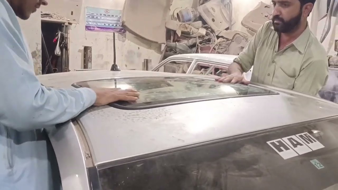 After Market Sunroof installation in Toyota iQ Chacha motors workshop 