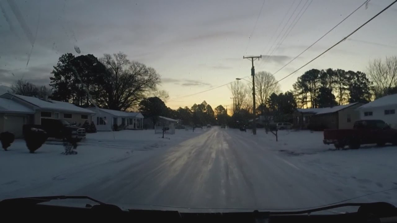 Team: Ice-covered roads remain following snow storm - YouTube