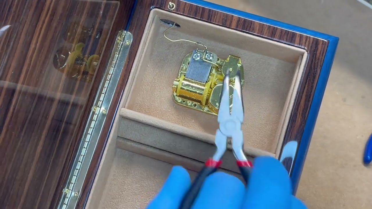 Adjusting the Wire Stopper on Music Box Attic Music Boxes - YouTube
