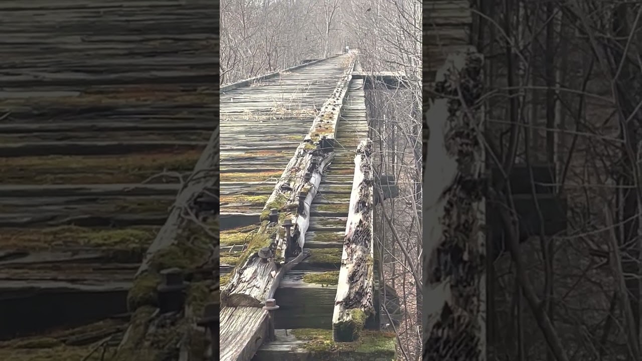 Monon High Bridge beyond the south end to private houses and white van 