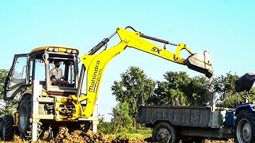 Amazing Mahindra- Mahindra Earthmaster Backhoe Loader Sx 90 Cutting Mud & loading in Tractor