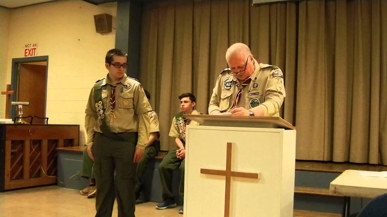 Michael is given his World Conservation Award patch by Mr. Abramson