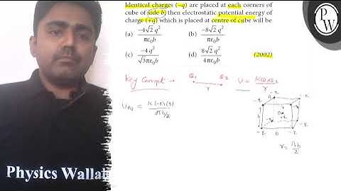 Identical charges (-q) are placed at each corners of cube of side b, then electrostatic potential...