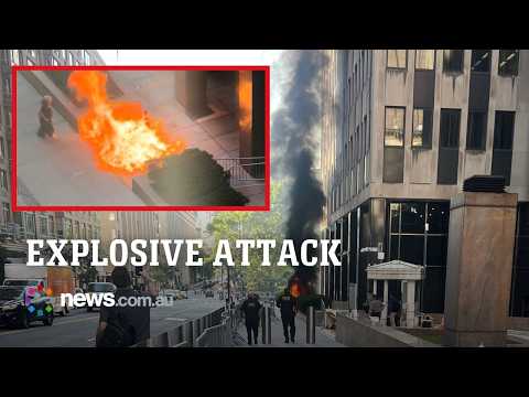 Dramatic moment anti-ICE activist sets fire outside NYC immigration building