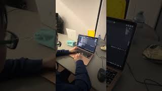 Student showing us how he programs in Python