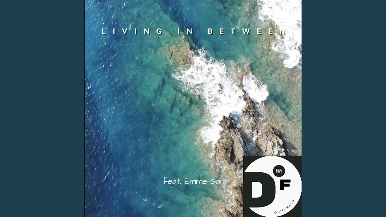 Living In Between (feat. Emme Sait)