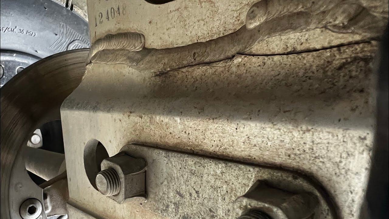 Cracked swing arm replacement part 2 on Suzuki LTZ 400 flip bike 15