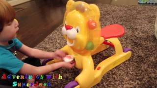 Adventures with Super Jack opeing and playing with 3-n-1 Step'n Ride Lion