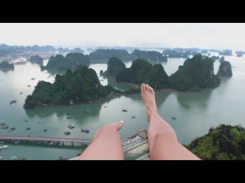 A Woman's Feet Dangling By A Cliff Top [ UHD Video ]