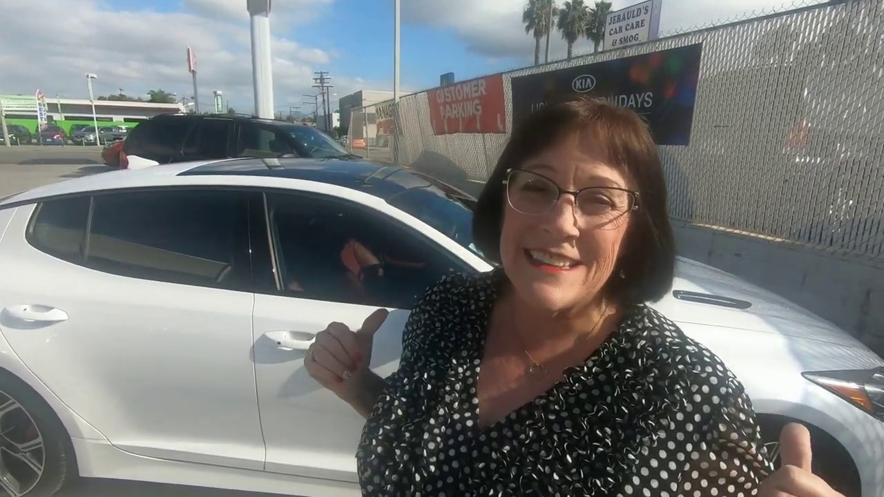 Susan Buys a Stinger at Ball Kia in National City, CA YouTube