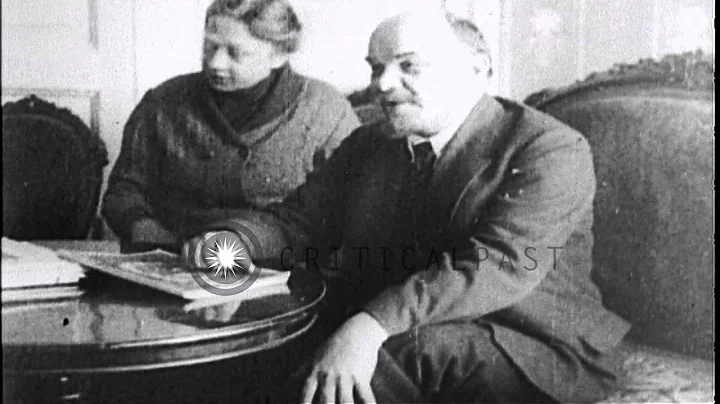 Russian Bolshevik leader Vladimir Lenin at desk wi...