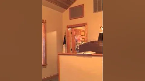 Joyce Holbrook plays the organ