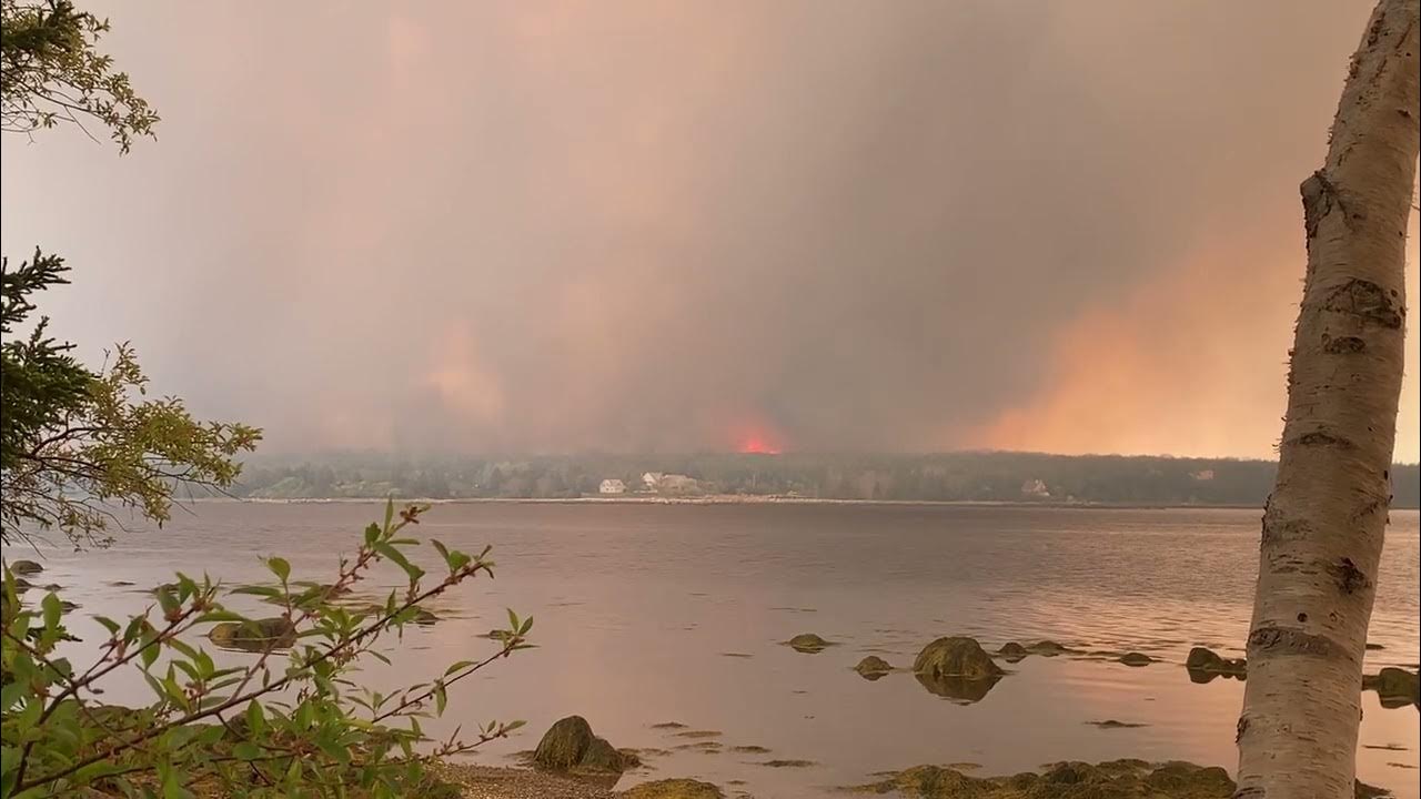 Fire in Port Saxon filmed from Port ClydeBarrington Lake Fire, NS