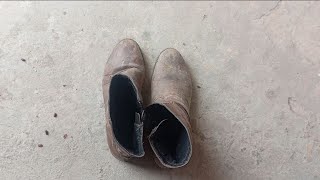 More well worn and dirty long boots | well worn brown leather boots