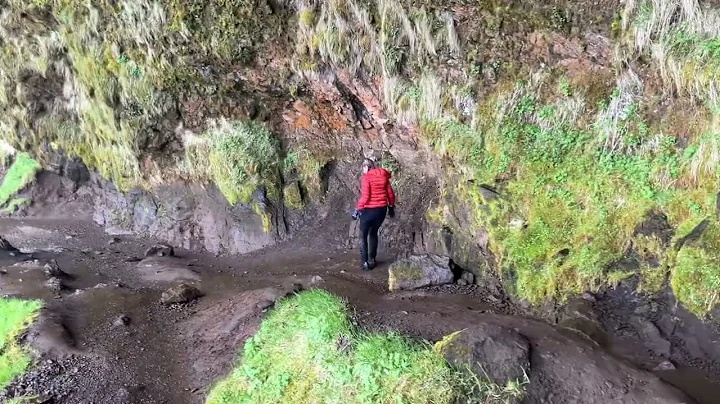 Walking behind Seljalandsfoss waterfall June 2024