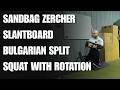 Sandbag Zercher Slantboard Bulgarian Split Squat With Rotation - THIRSTgym.com