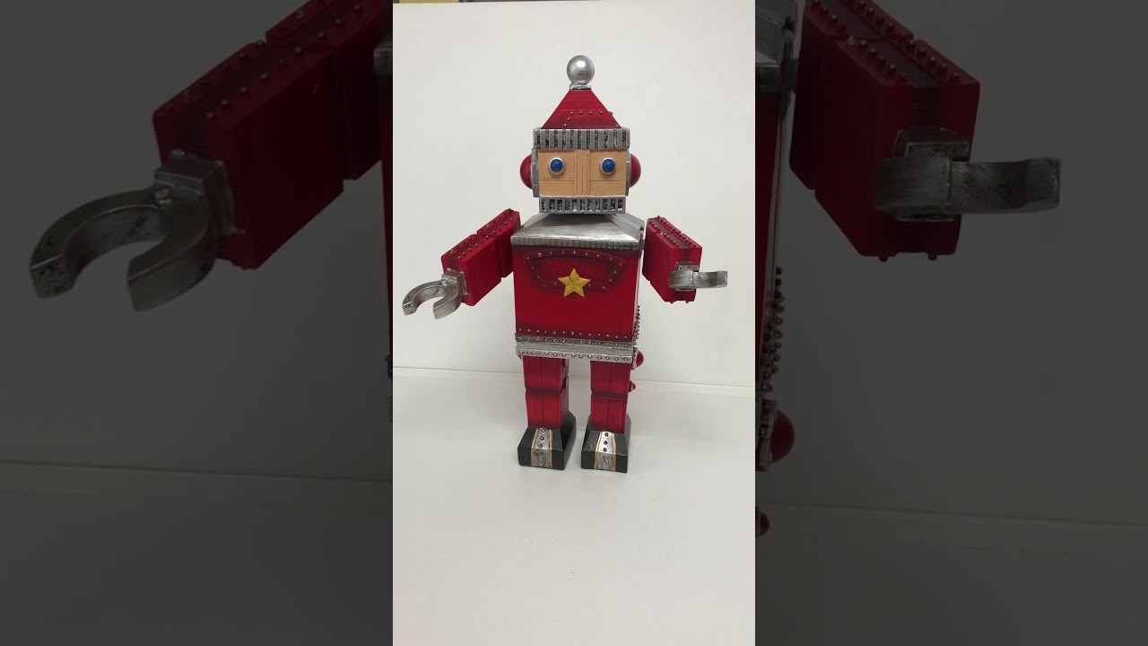 サンタロボットオルゴールSKATING SANTA WITH REVOLVING VASE – Living