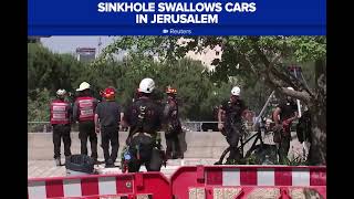 Sinkhole swallows parked cars in Jerusalem