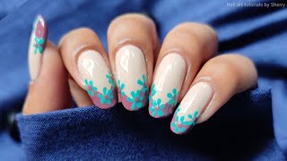 Easy French floral nail art with toothpick