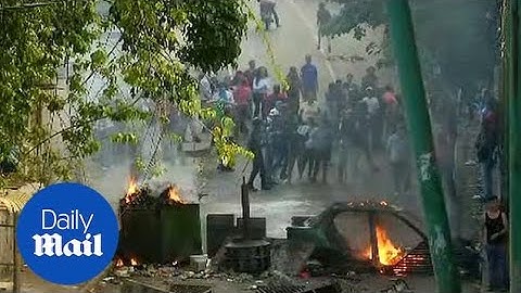 Venezuelan army fire tear gas at protesters near National Guard outpost