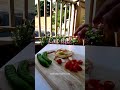Cooking fresh cucumber and tomato salad in California #healthy #food #salad #freshfood #homemade