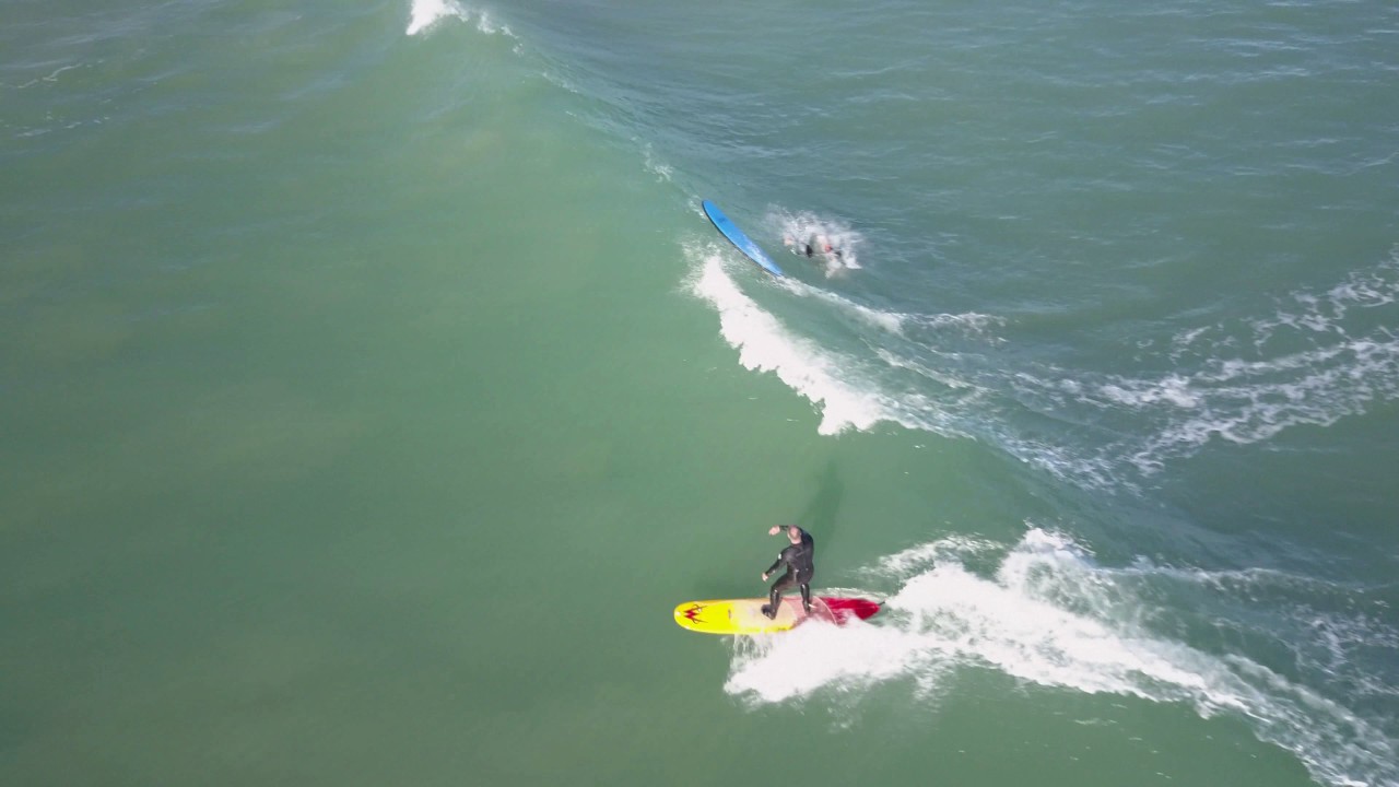 Surfers at Middleton Point, South Australia.