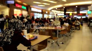 People Sit At Cafe Near In