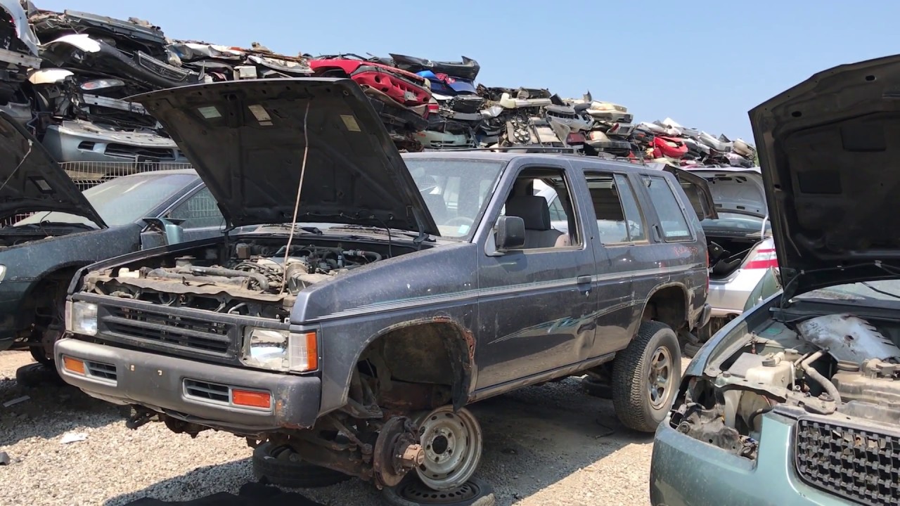 Old Nissan Pathfinder With A Very Rotten Frame At The Junk Yard Old Nissan Pathfinder With A Very Rotten Frame At The Junk Yard