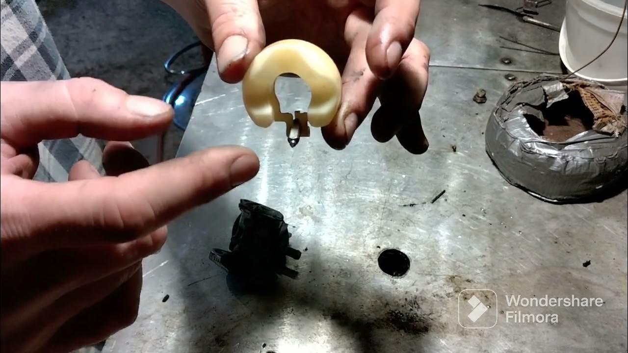how to take a carburetor off and clean it and flush tank out on