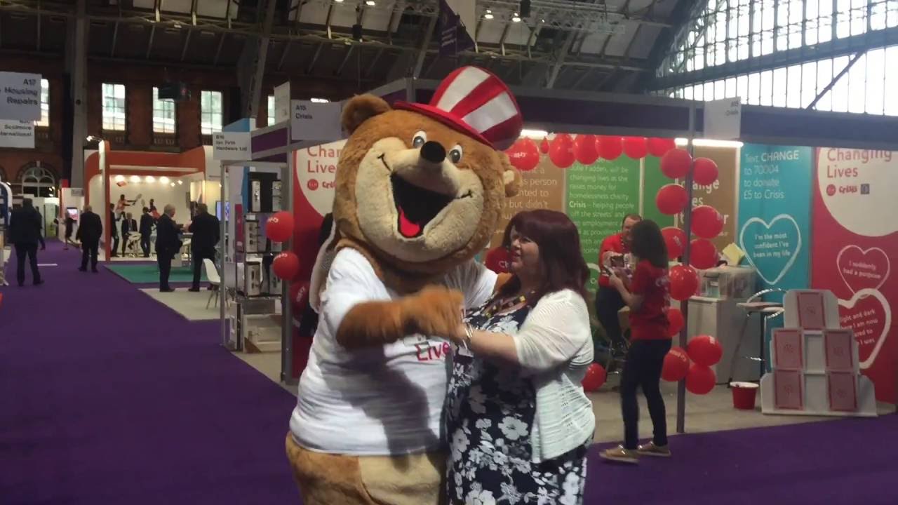 SLH Group chief exectuive dances with giant bear