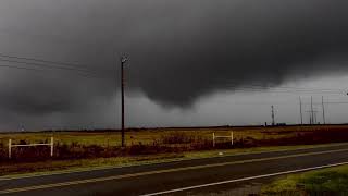 Textbook QLCS tornado along line of storms west of Mustang Oklahoma.