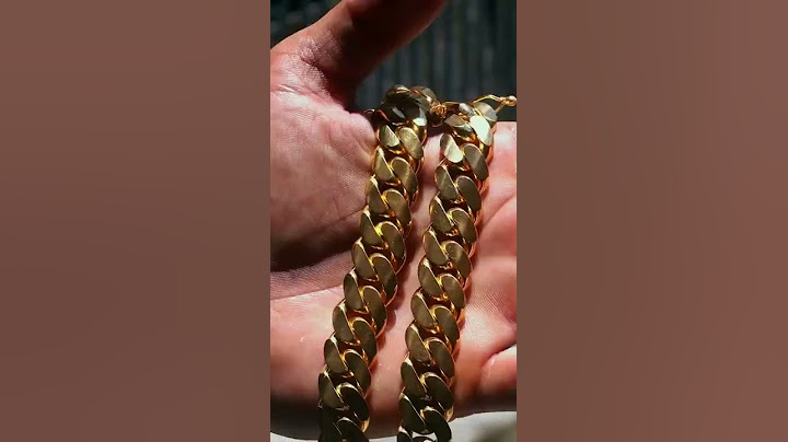 Haciendo a mano una impresionante cadena cubana de oro de $ 25,000
