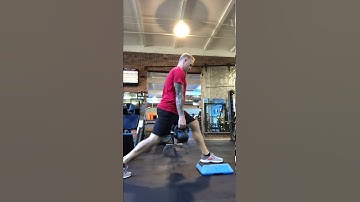 Deficit lunge with Kettlebell