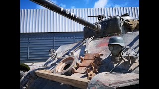 WW2 Tank Fury being moved around out of maintenance from the gunners hatch