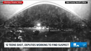 Latest on a mass shooting with 12 injured at Macon park