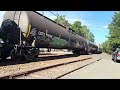 CSX 4562 SD70MACe leads CSX M404 with a Nice K5LA at Piscataway