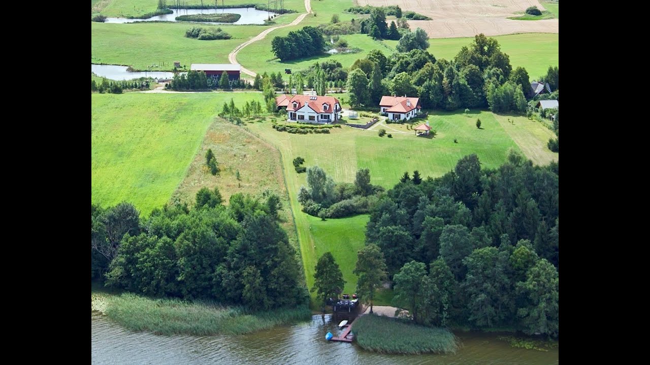 Klimatyczna posiadłość nad jeziorem w Łaśmiadach z linią brzegową na Mazurach