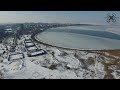 Снежен Бургас и замръзналото езеро от високо