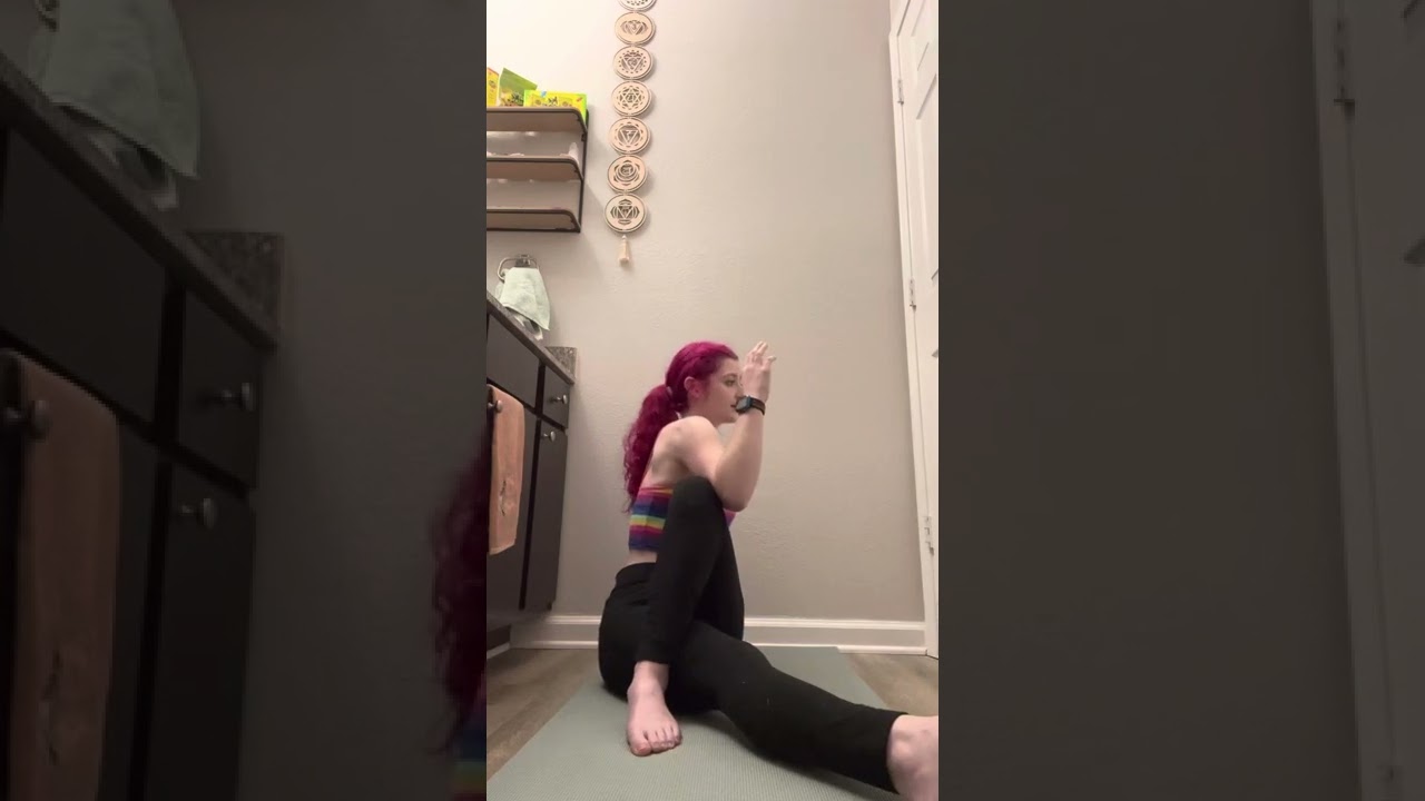 PE-153 Maymester: Seated spinal twist demonstration.