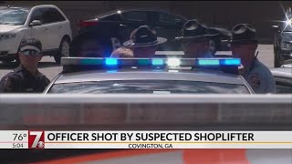 Officer shot by suspected shoplifter