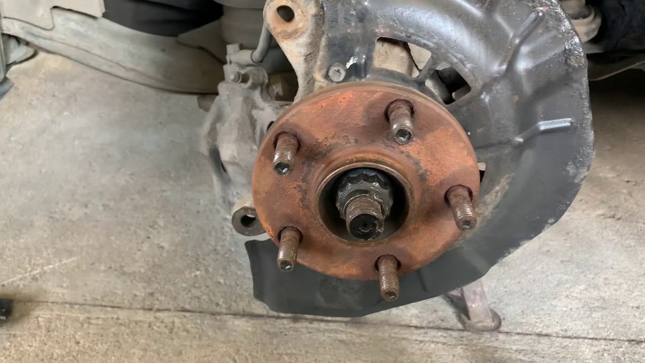 замена колодок ручника камри 40