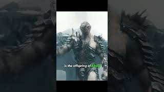 Why is Azog a white-skinned orc while his son Bolg is brown-skinned?