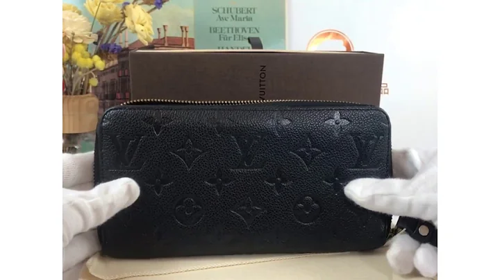 【雪曼國際精品】LV M60571 黑色經典字紋壓紋拉鍊長夾~二手商品9.2成新