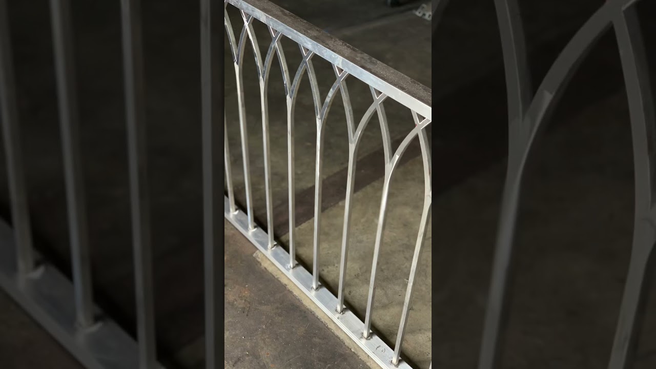 Welding some Gothic arch aluminum railings 