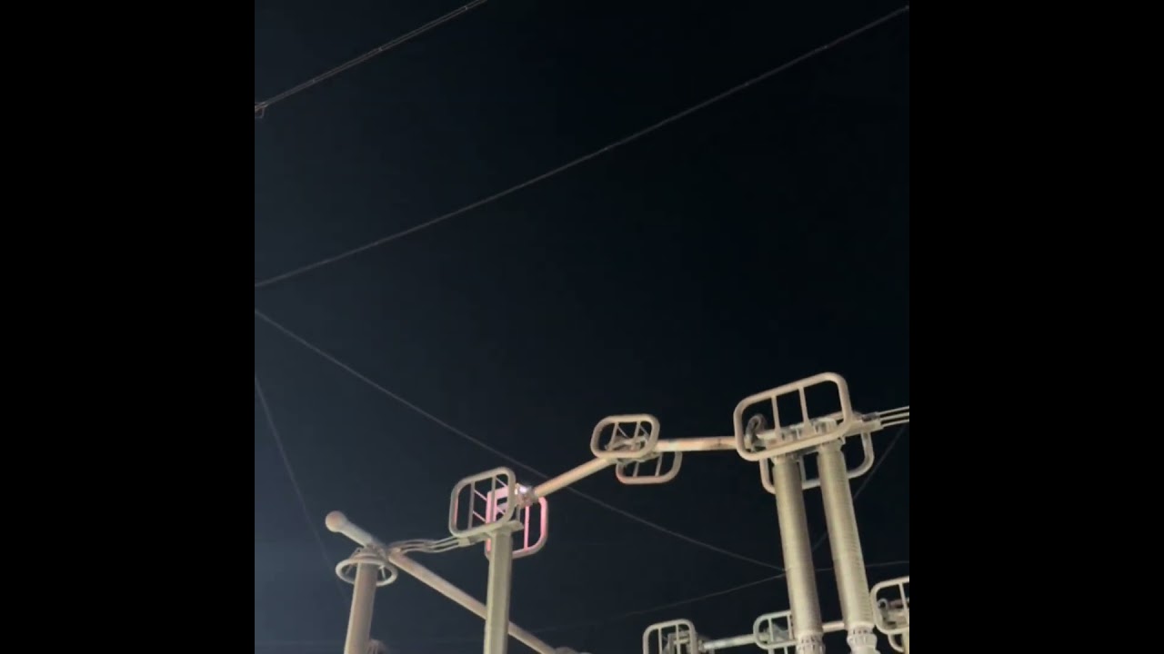 The moment when the ultra-high voltage knife switch, which looks like a mechanical arm, is closed