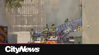 Firefighters battle three-alarm industrial blaze in Etobicoke