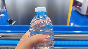 Laser marking on the mineral water bottle production line.