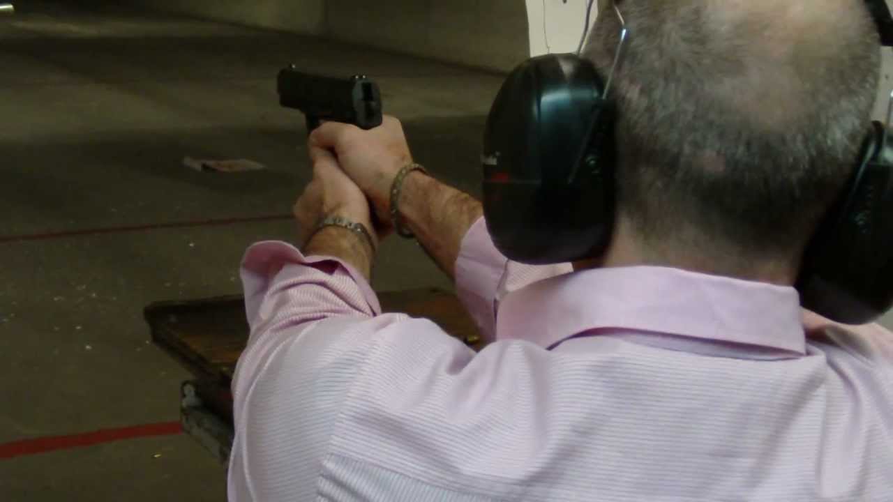 Paul shooting a hand gun at Reds indoor range Austin Teaxas